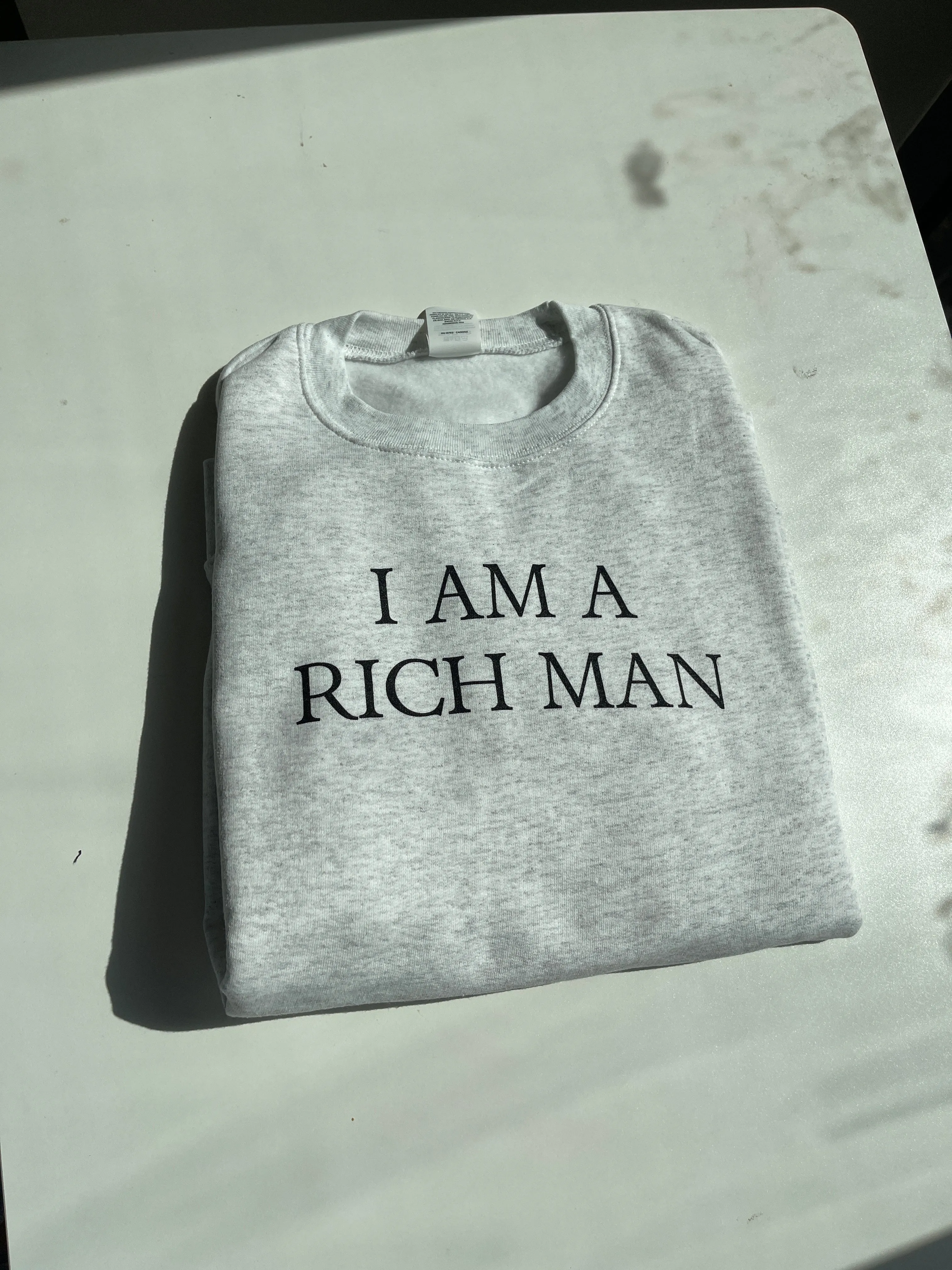 i am a rich man crewneck