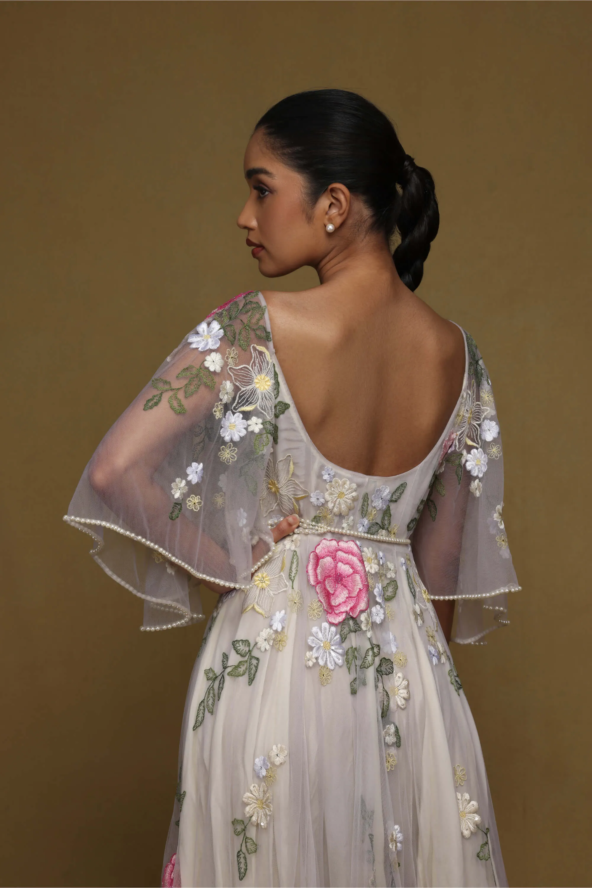 Nude floral gown with pearl belt