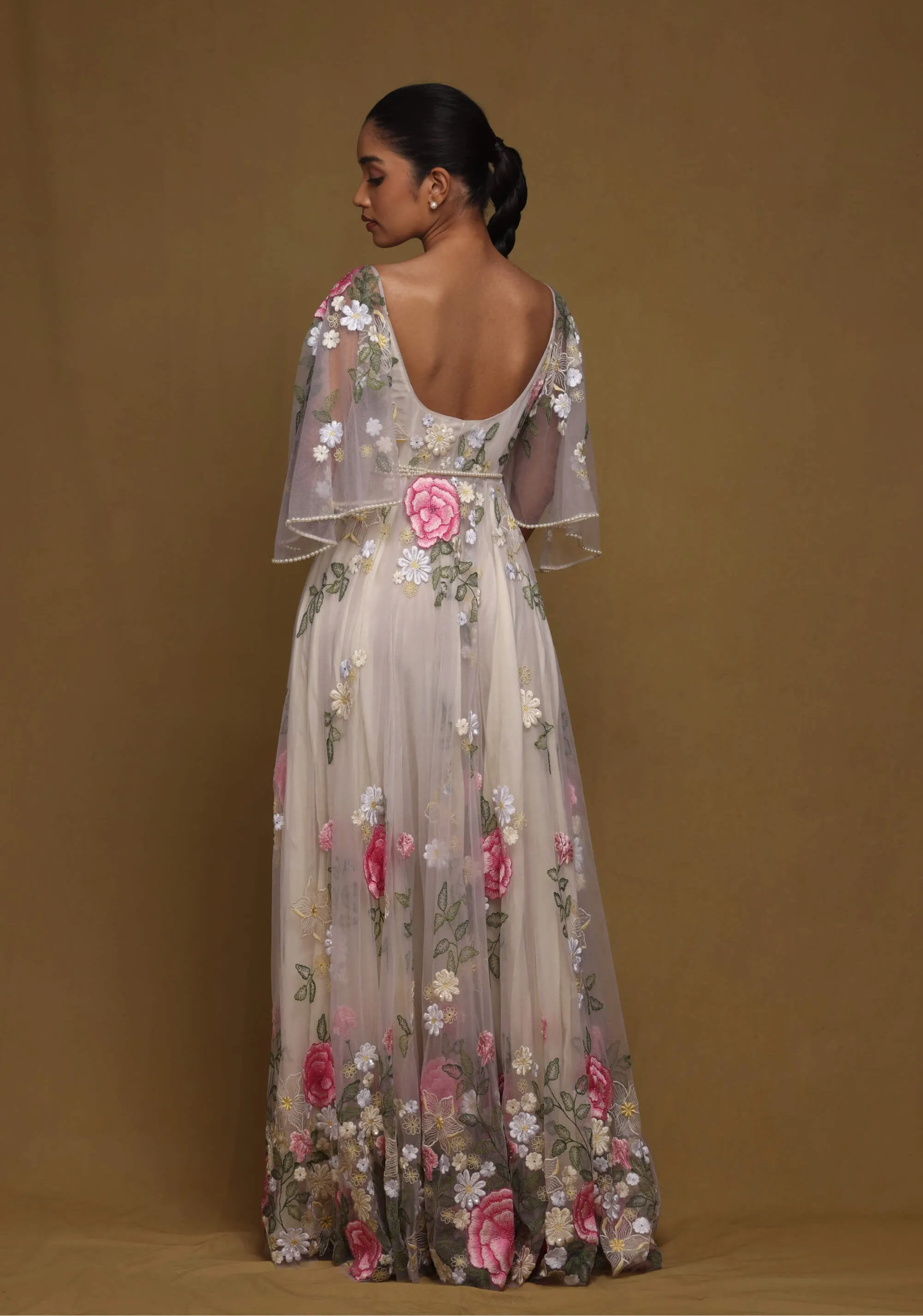 Nude floral gown with pearl belt