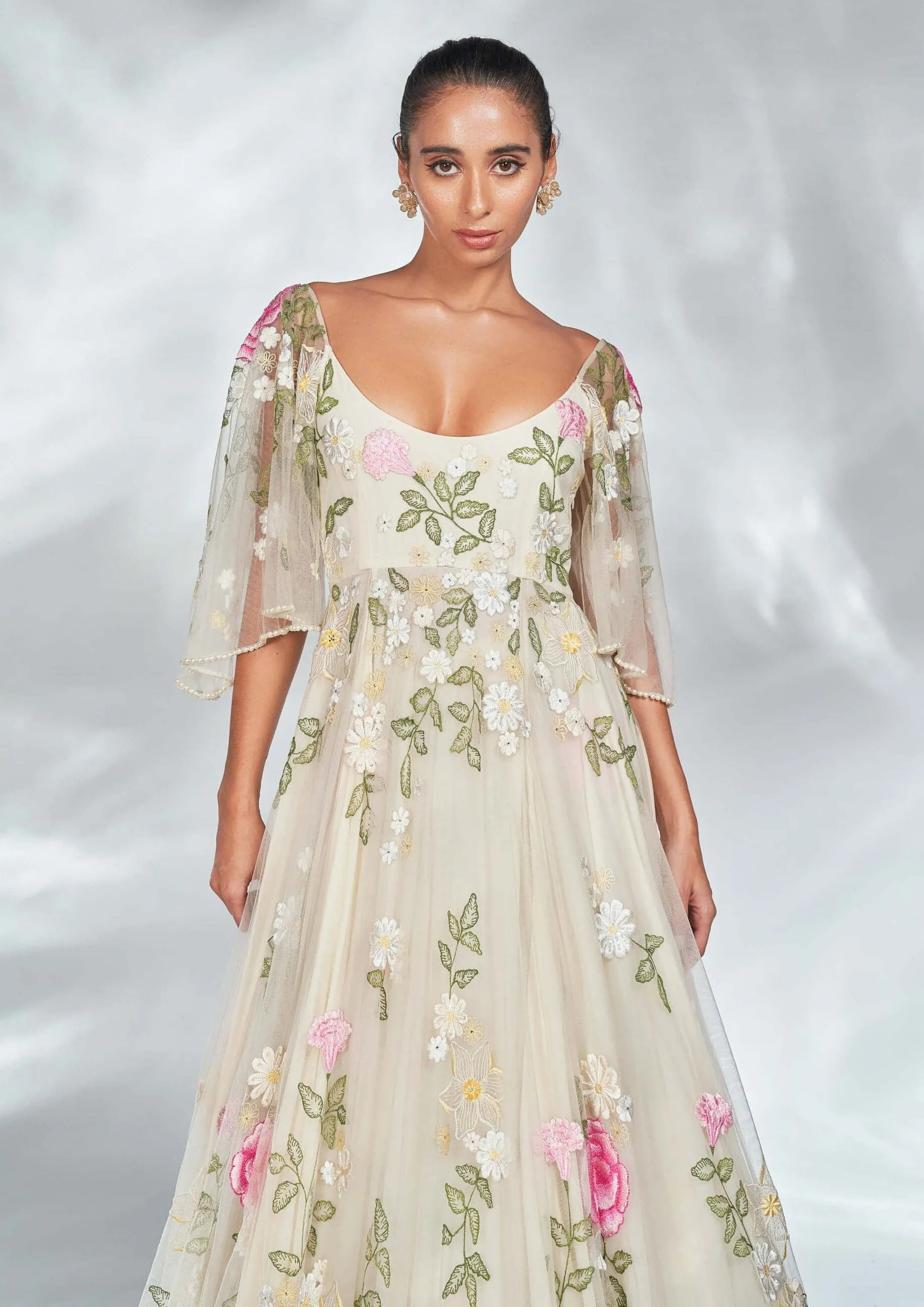 Nude floral gown with pearl belt