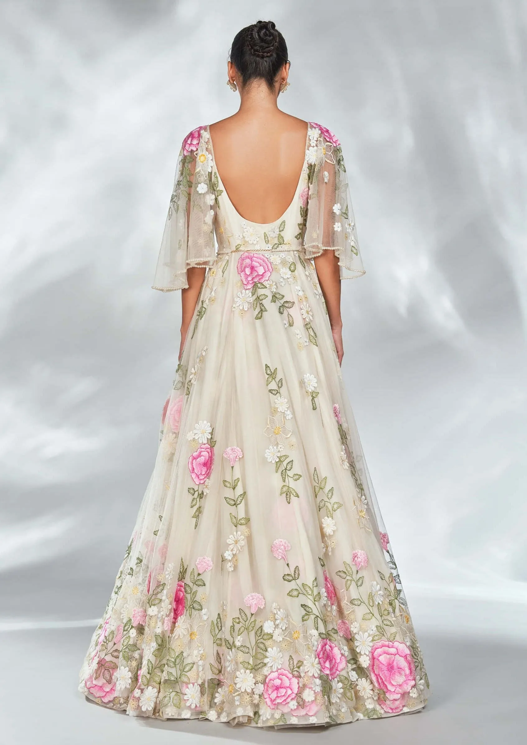 Nude floral gown with pearl belt