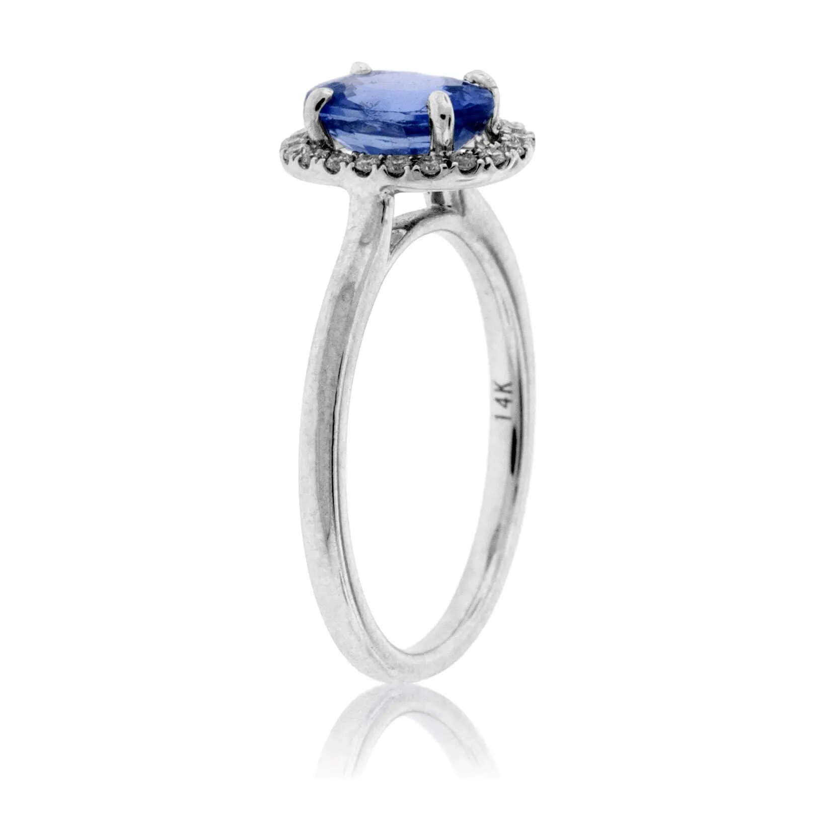 Oval Tanzanite and Diamond Halo Ring